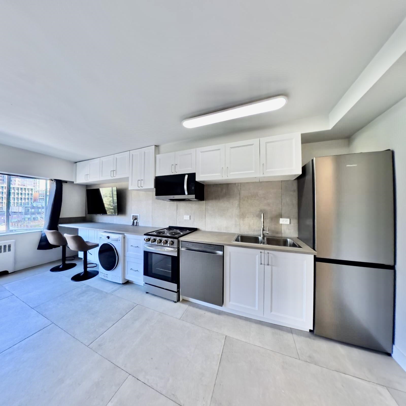Unit 101 - 1540 Haro Street, Vancouver 4